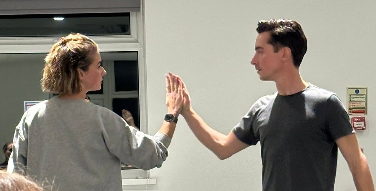 Pride and Prejudice rehearsal, a high five mid-scene