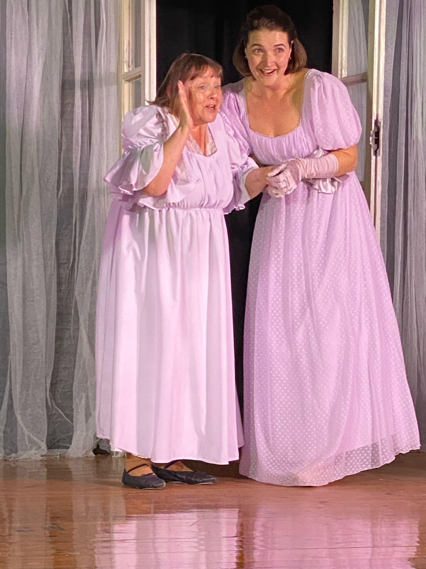 Much Ado About Nothing, two of the company in lilac gowns